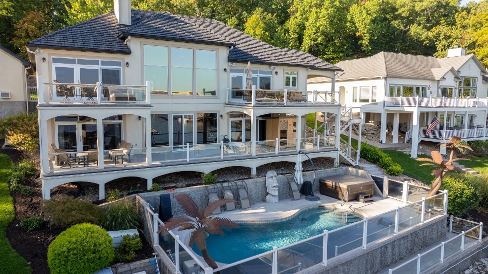 Back of home with pool